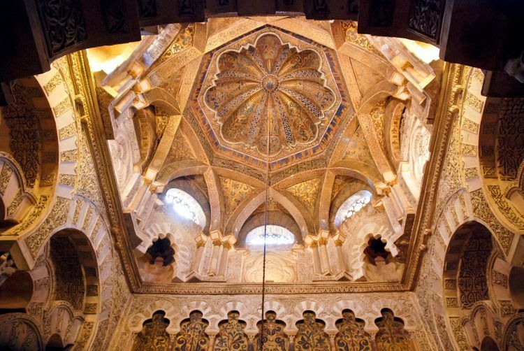 A view from within the mosque of the dome, showing an intricate use of arches.